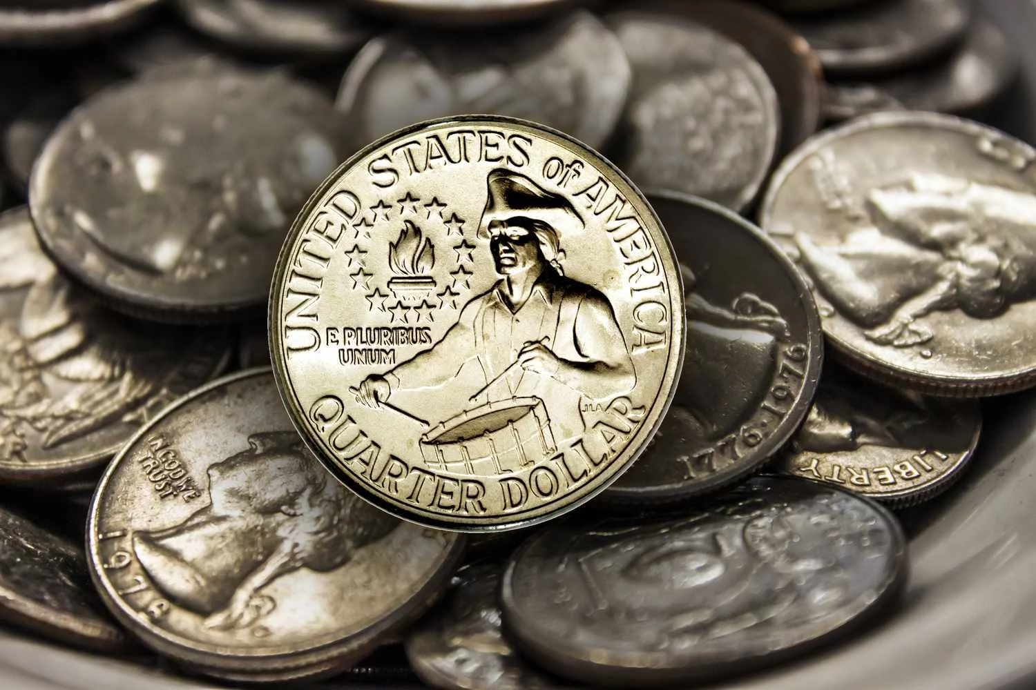 Eight Rare Dimes and Rare Bicentennial Quarter Worth $52 Million Each